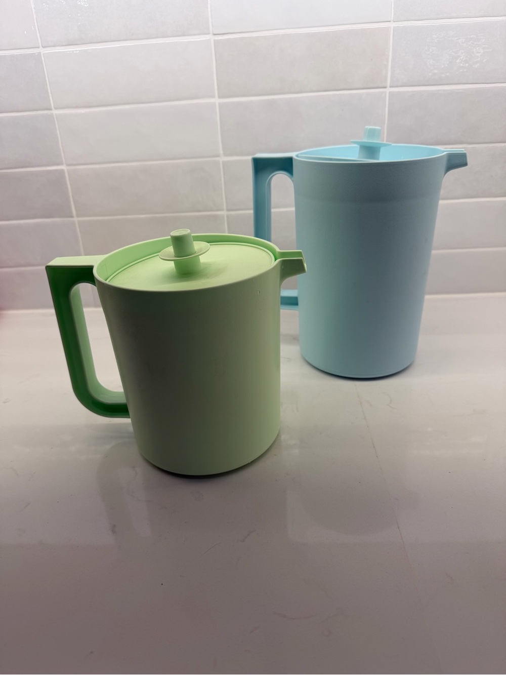 Tupperware Pastel Green and Light Blue Plastic Pitchers with Lids